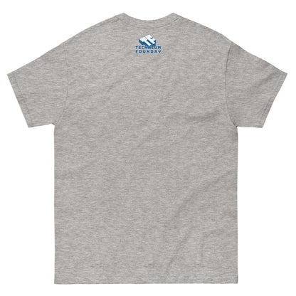 Back view of gray T-shirt with small blue logo on upper back, minimalistic design.