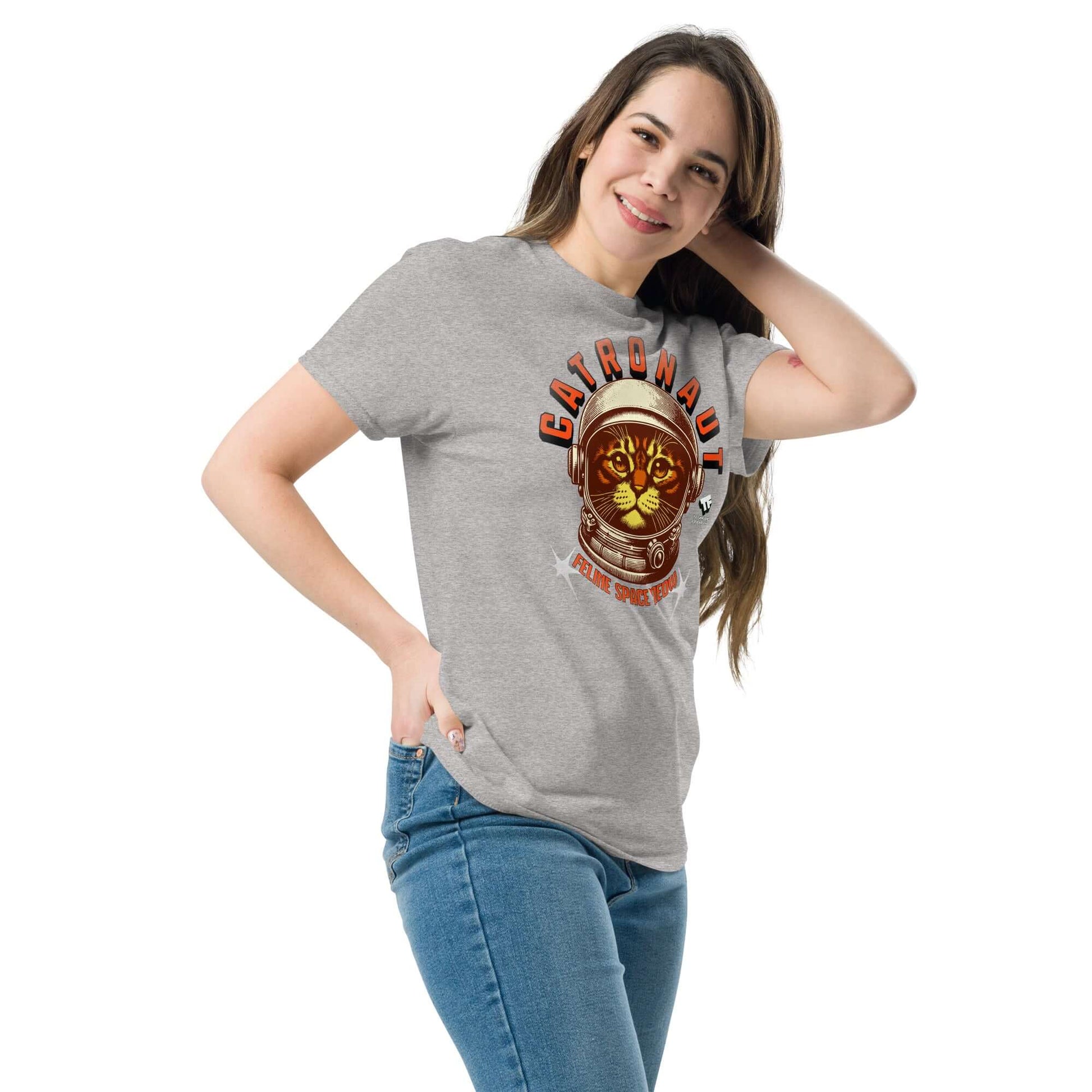 Woman wearing Catronauts Feline Space Medal T-Shirt by Technium Foundry, featuring space cat in helmet design.