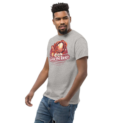 Gray t-shirt featuring "Lettuce Turnip the Beet" pun design with vintage sunset illustration, worn by a man in jeans.