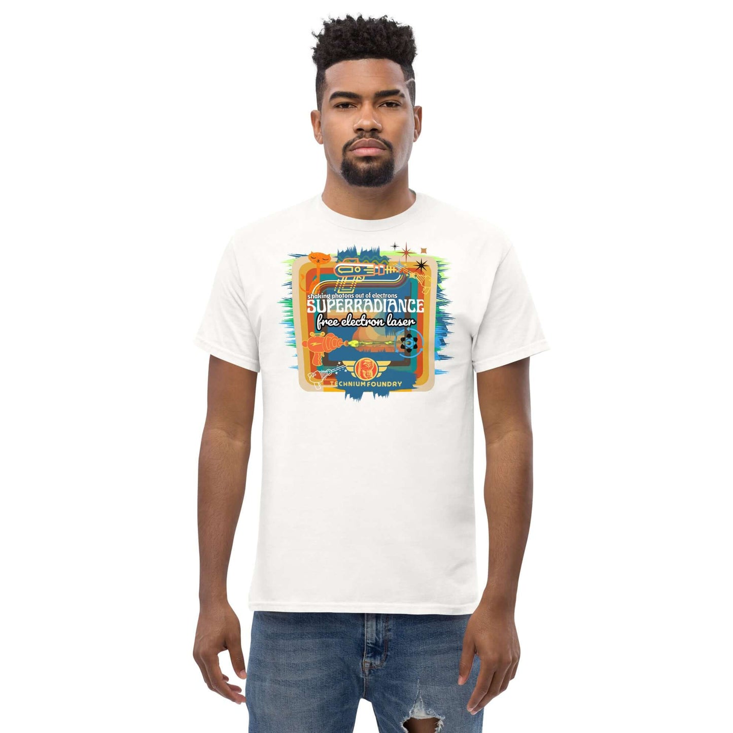 Retro-style Superradiance Free Electron Laser T-Shirt with vibrant science-themed design, modeled by a man in jeans.