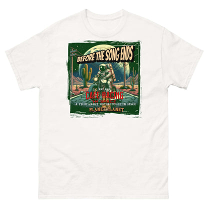 Vintage cafe racer t-shirt featuring astronaut in desert scene with cacti and celestial elements, framed in distressed green border.