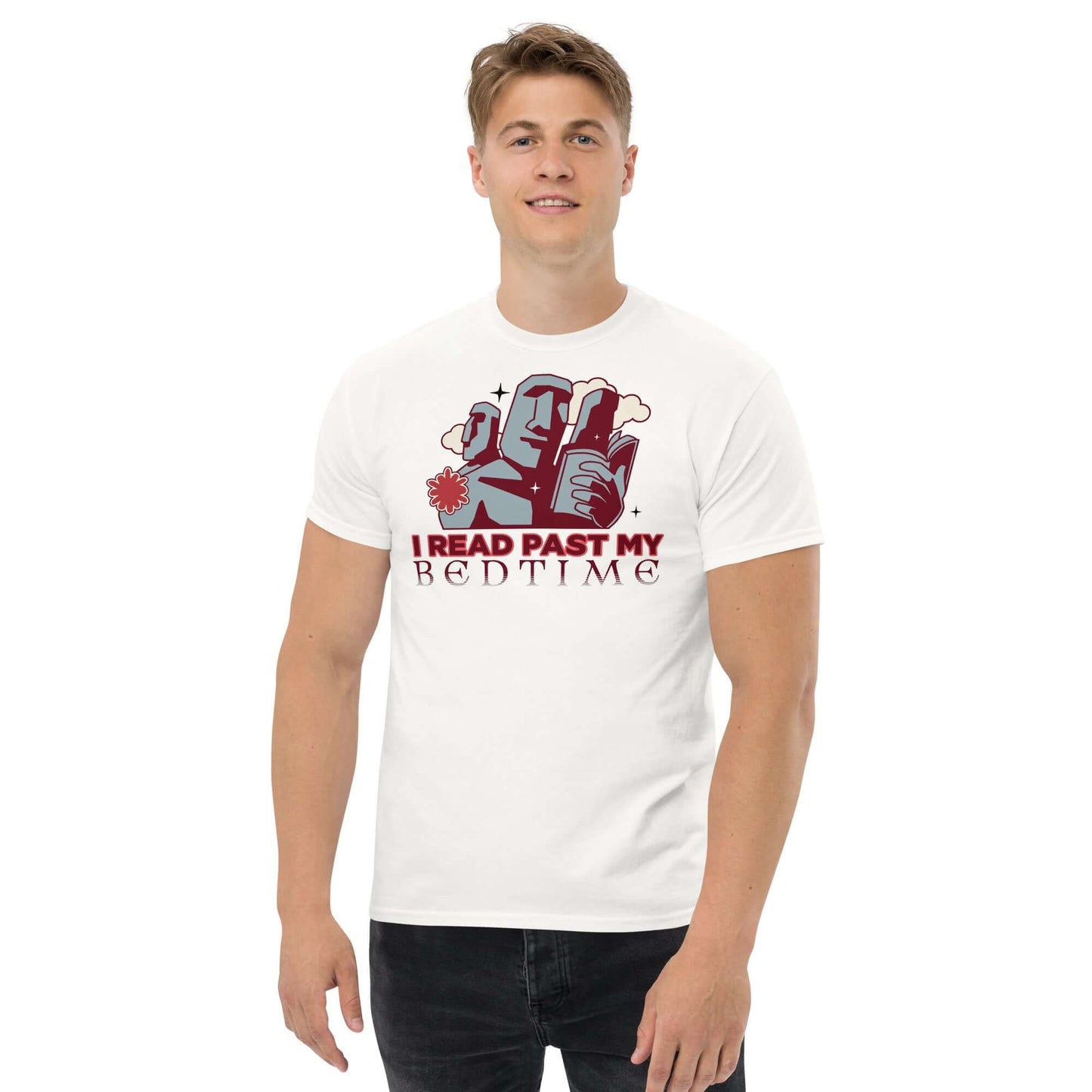 Man wearing "I Read Past My Bedtime" T-shirt with moai heads and books design, Easter Island theme in dusky rose and gray colors.