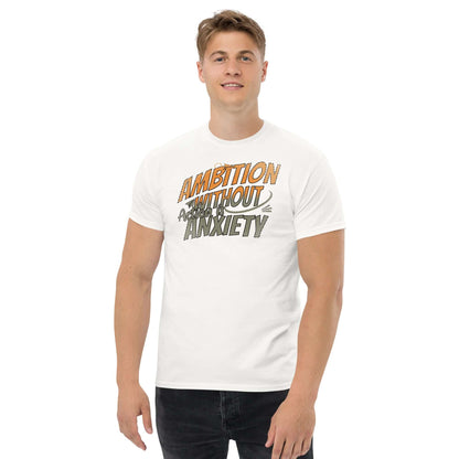 White "Ambition Without Anxiety" t-shirt with overlapping typography design, worn by a smiling person, promoting mental health humor.