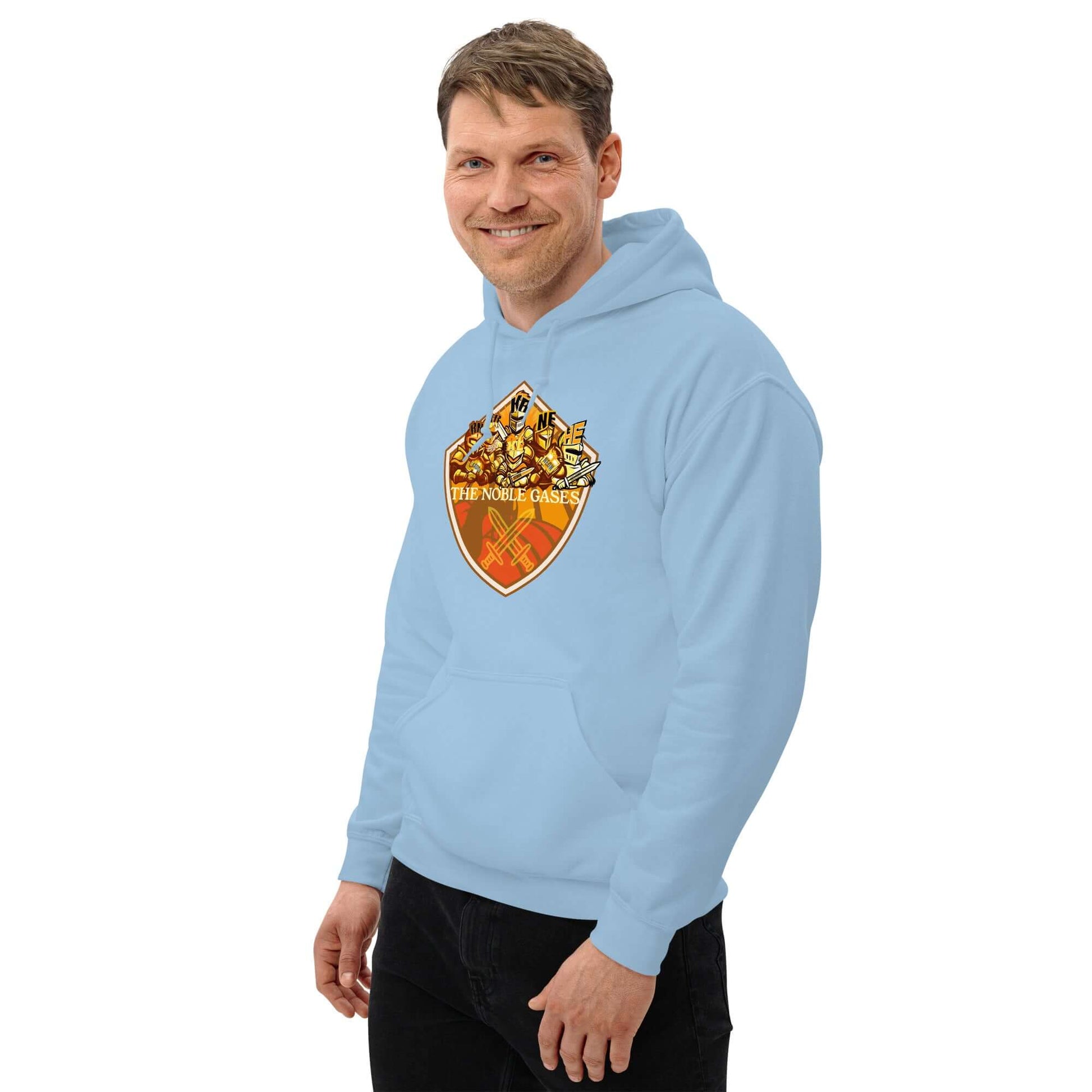 Man wearing The Noble Gases Hoodie with periodic table elements shield design in light blue, showcasing scientific style and individuality.