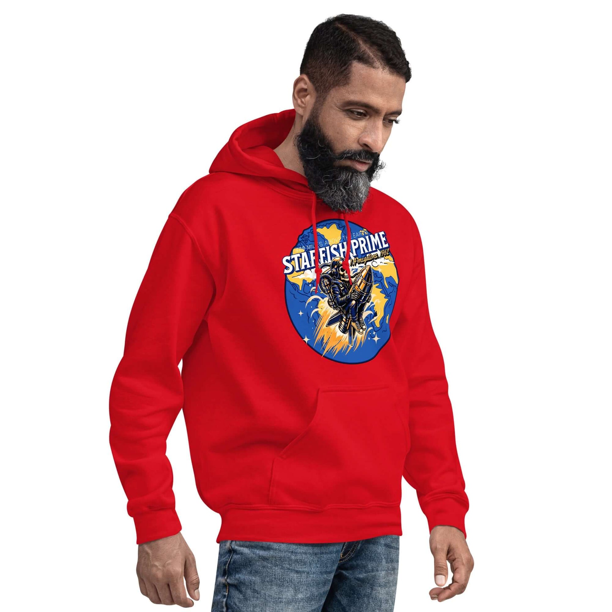 Man wearing a red Starfish Prime hoodie featuring retro nuclear space test design.