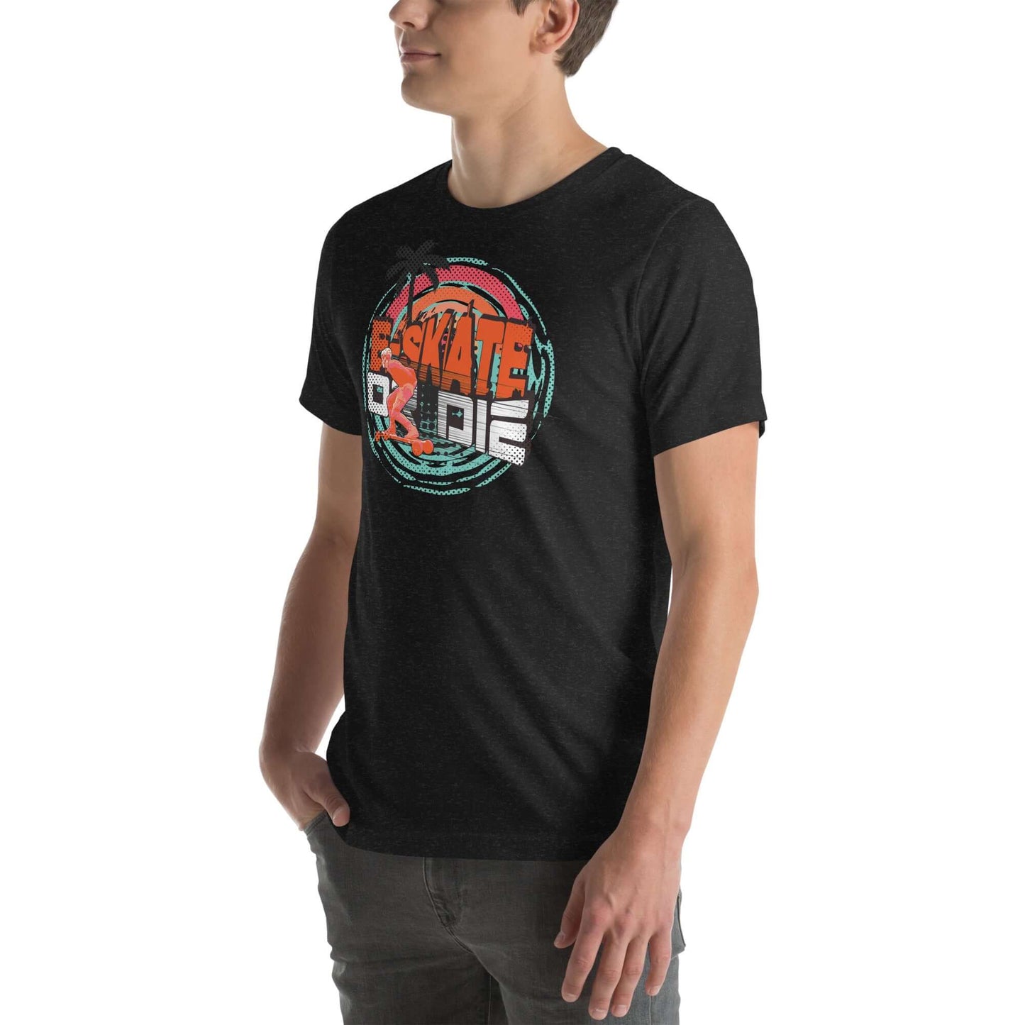 Man wearing eSkate Life T-Shirt with retro sunset design, celebrating tropical electric skateboarding vibes, palm trees, and lithium-ion power.