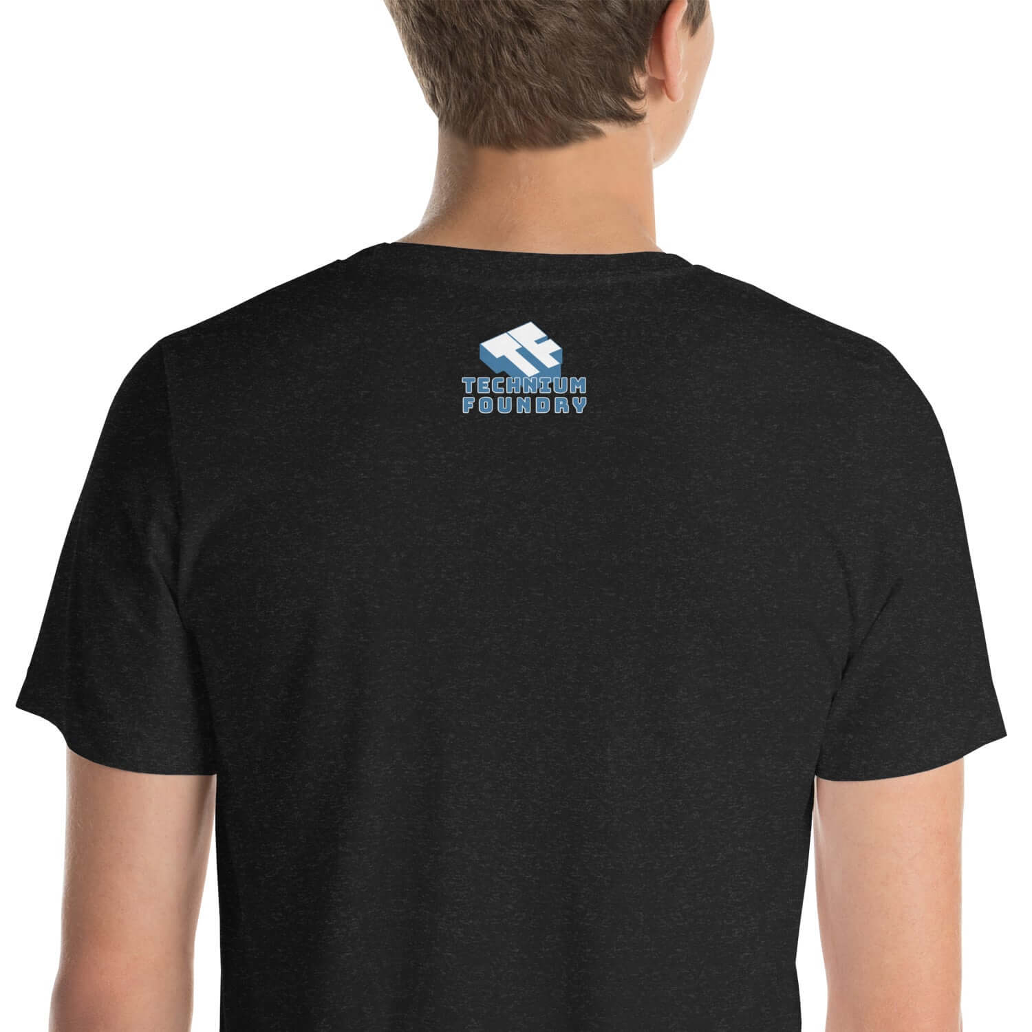 Back view of black T-shirt with Technium Foundry logo in light blue on upper back.