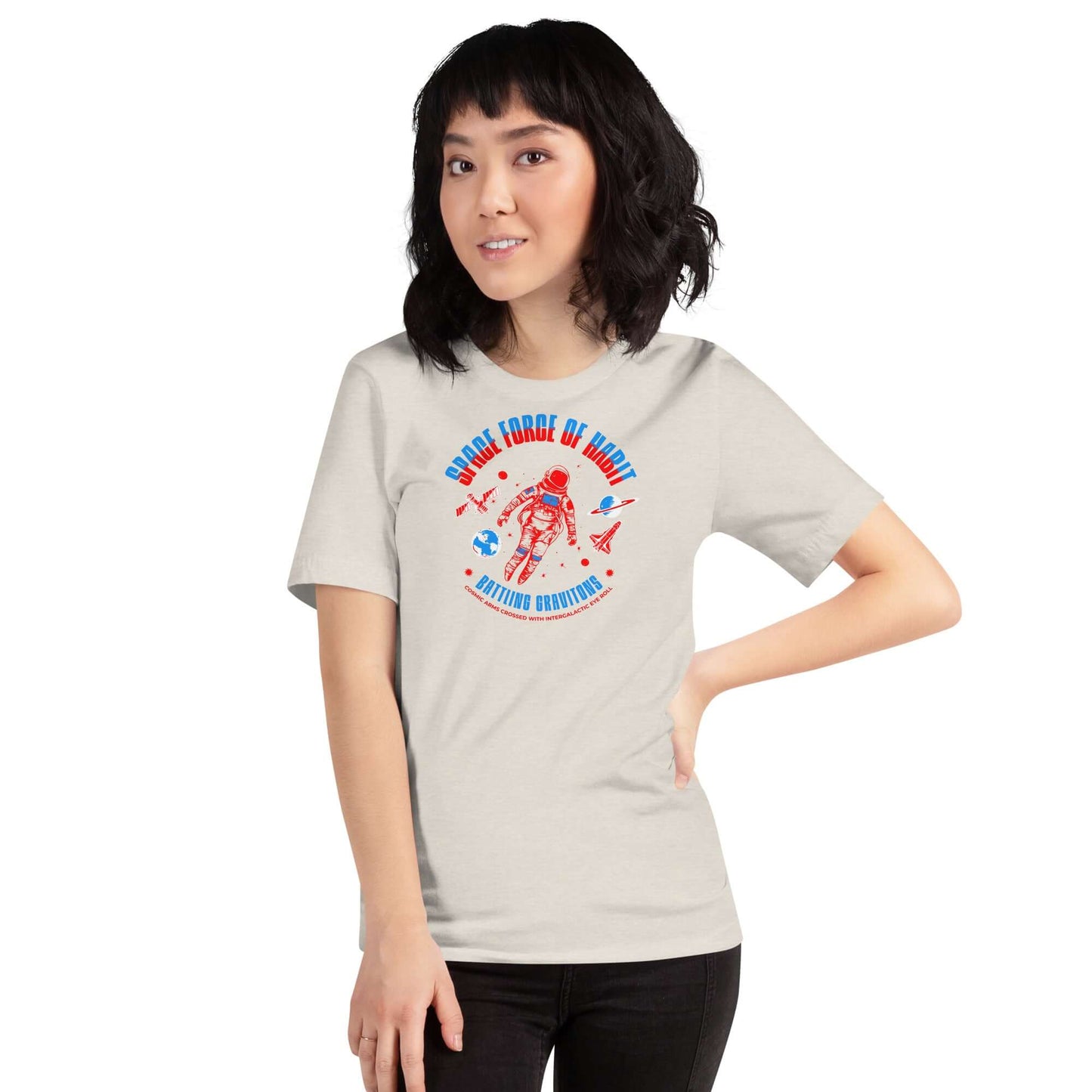 Space Force of Habit T-Shirt featuring an astronaut in zero gravity with satellites, worn by a model. Humorous astronaut design.