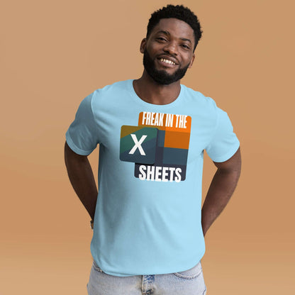 Smiling person wearing 'Freak in the Sheets' T-shirt with retro Excel design, celebrating data skills and pivot table mastery.