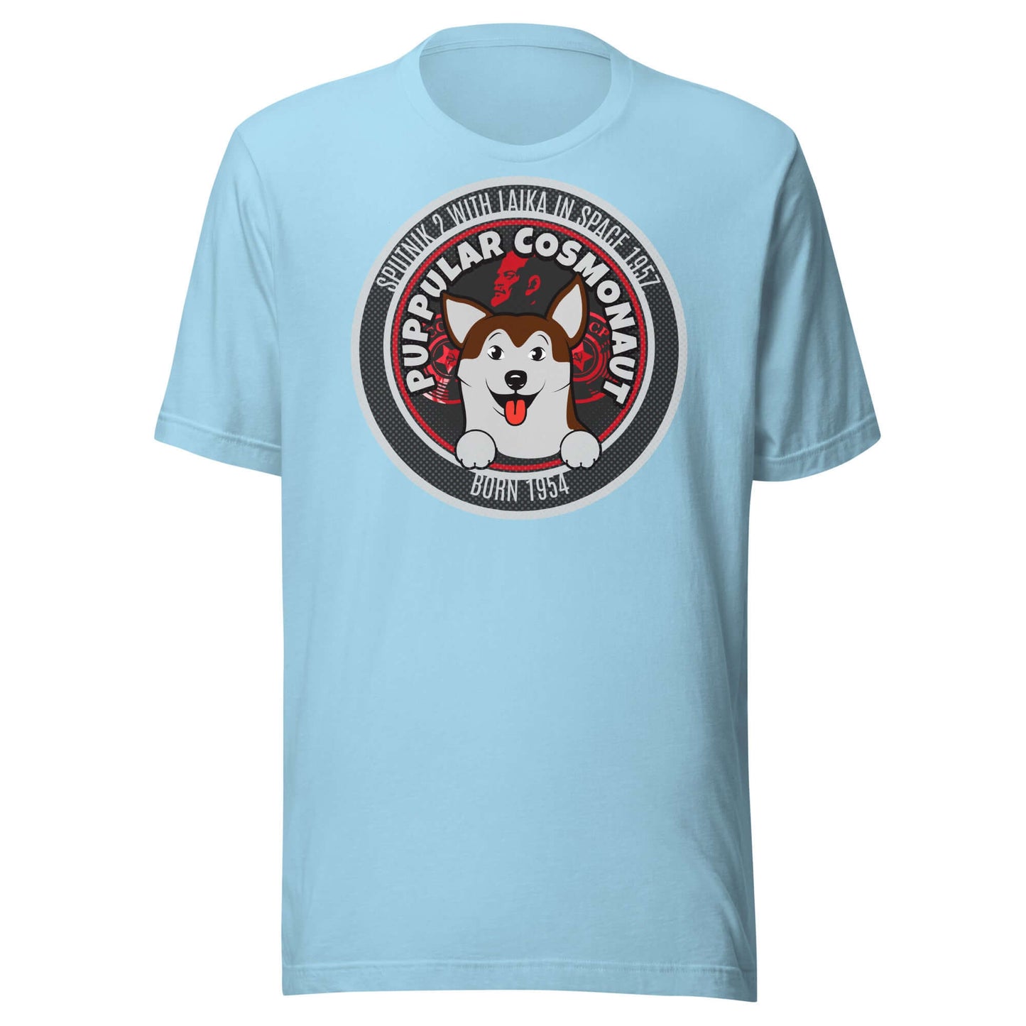 Light blue T-shirt featuring a retro emblem design of a space dog with the text 'Puppular Cosmonaut'. Perfect for space and dog enthusiasts.