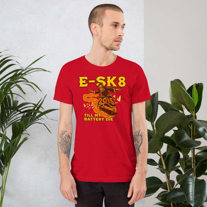 Man wearing red "E-SK8 Till My Battery Dies" t-shirt featuring Grim Reaper with an electric skateboard design.