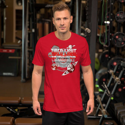 Man wearing a red Tired Light T-Shirt with retro sci-fi design featuring planets and cosmic themes.