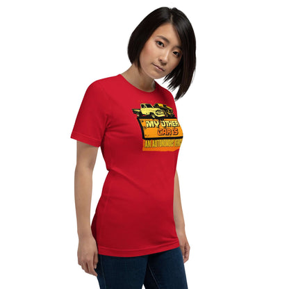 Woman wearing red "My Other Car Is An Autonomous Vehicle" T-shirt with vintage car graphic.