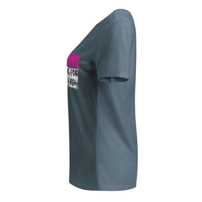 Side view of a 'Girls Just Wanna Do Science' T-shirt with pink and black text on a blue-gray fabric.