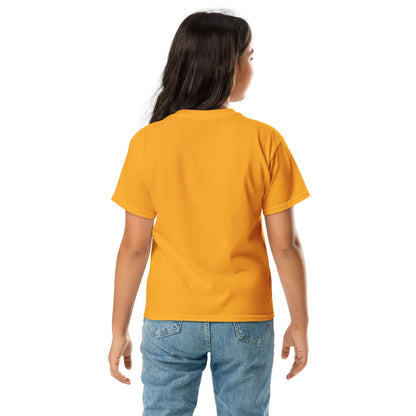 Child wearing orange t-shirt and blue jeans, viewed from the back.