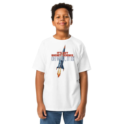 Boy wearing "It's Not Rocket Science... Oh Wait, It Is!" t-shirt featuring a rocket design, playful science-themed apparel.